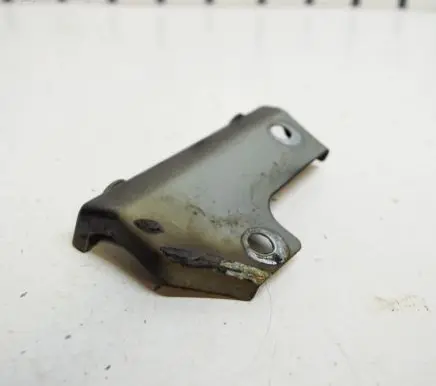 Volkswagen Caddy Fender mounting bracket 1T0810334A