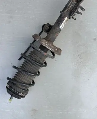 Front shock absorber with coil spring