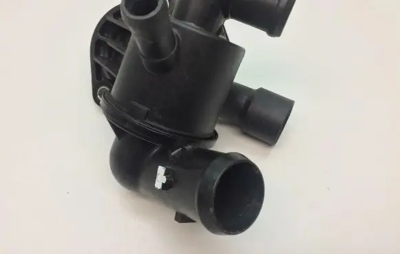 Volkswagen Eos Thermostat housing 03L121111AC