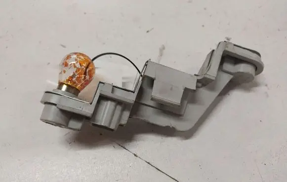 Volvo V50 Tail light bulb cover holder 28127002