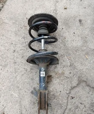 Front shock absorber with coil spring