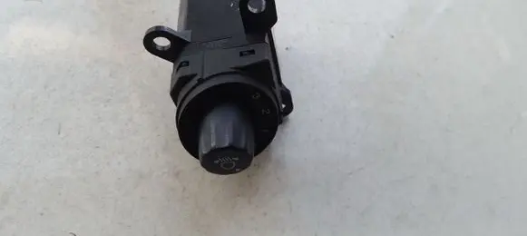 Headlight level height control switch
