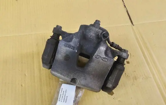Hyundai Tucson TL Front brake caliper
