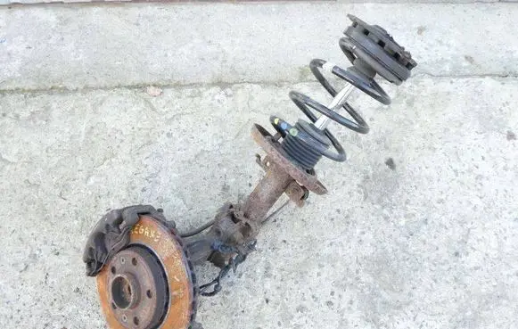 Front wheel hub spindle knuckle