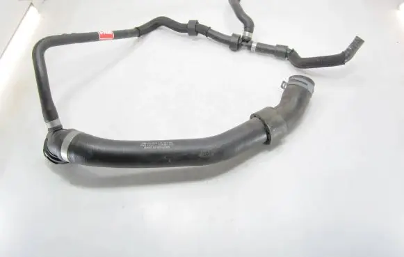 Volkswagen Golf VII Engine coolant pipe/hose 5Q0122101CN
