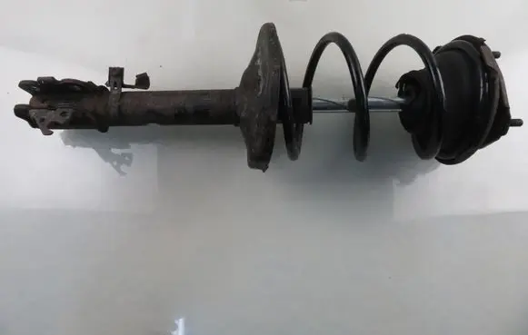 Front shock absorber with coil spring