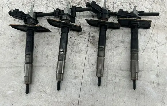 Volkswagen PASSAT B7 Fuel injectors set 0445116030 03L130277