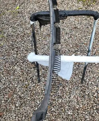 Rear bumper mounting bracket