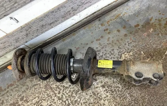 Front shock absorber with coil spring