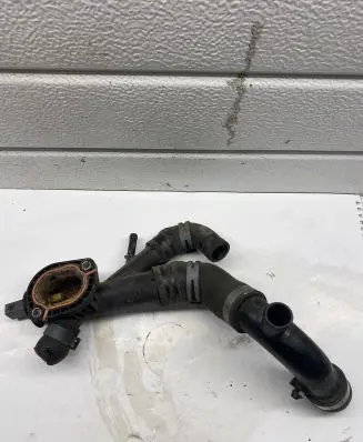 Volkswagen PASSAT B7 Engine coolant pipe/hose 03L121131AA