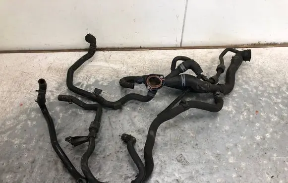 Volkswagen Touran I Engine coolant pipe/hose 7N0121087ABILI 7N0121087A 5N0122109A