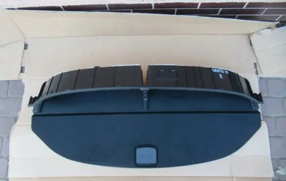 Hyundai Santa Fe Parcel shelf load cover 857172W000