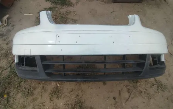 Volkswagen Touran I Front bumper 1T0807221 1T0807217