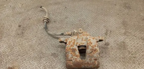 Opel Corsa D Front brake caliper 