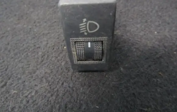 Headlight level height control switch