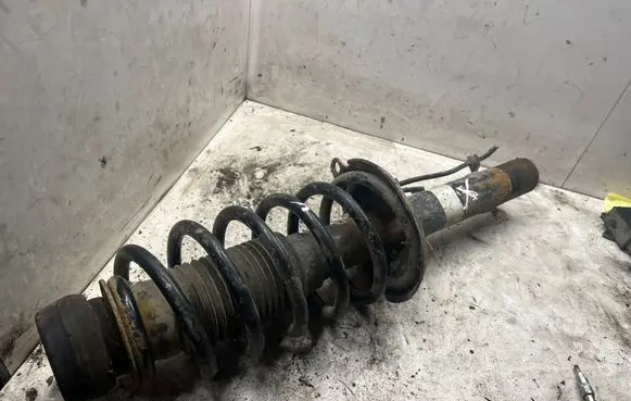 Volkswagen Golf IV Front shock absorber with coil spring