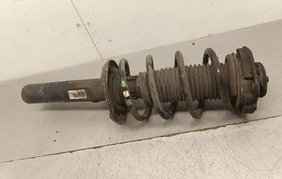 Audi Q3 8U Front shock absorber with coil spring 5N0413031AE