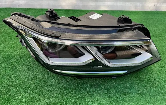 Volkswagen Tiguan Headlight/headlamp 5NB941082H 0301119234AB