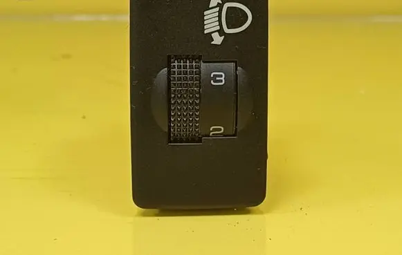 Ford Maverick Headlight level height control switch YL8413K196AAW