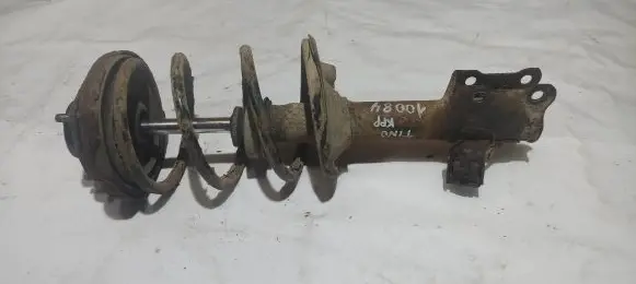 Nissan Almera Tino Front shock absorber with coil spring