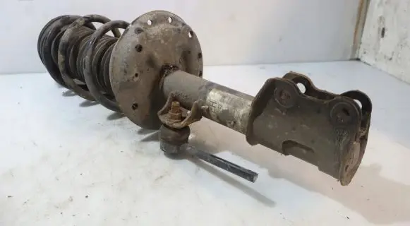 Opel Corsa D Front shock absorber with coil spring