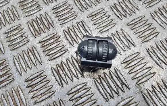 Headlight level height control switch