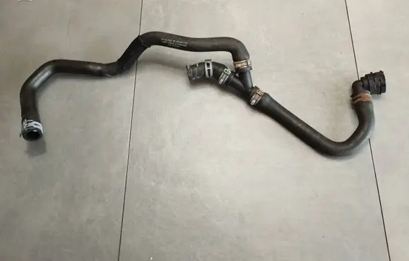 Volkswagen Golf VII Engine coolant pipe/hose 5Q0122073AN