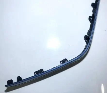 Rear bumper trim bar molding