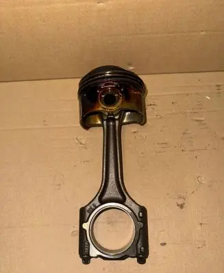 Volkswagen Golf VII Piston with connecting rod 06LD