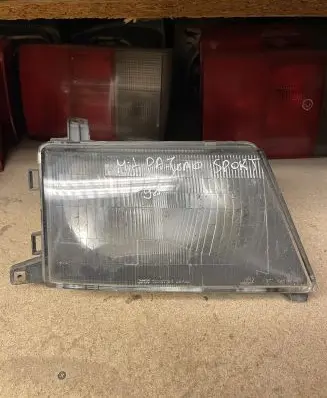 Mitsubishi Pajero Sport I Headlight/headlamp 11087194 11087195