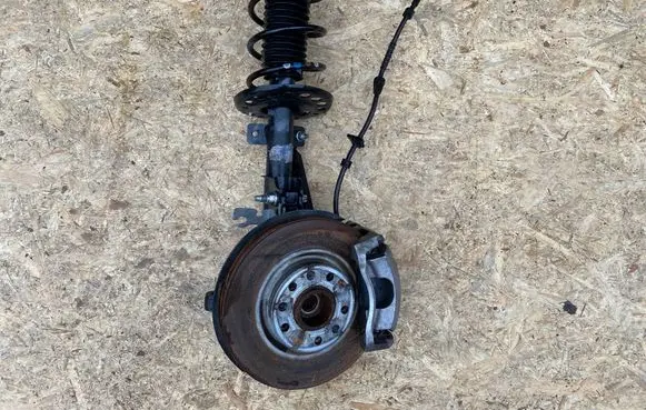 Front wheel hub spindle knuckle