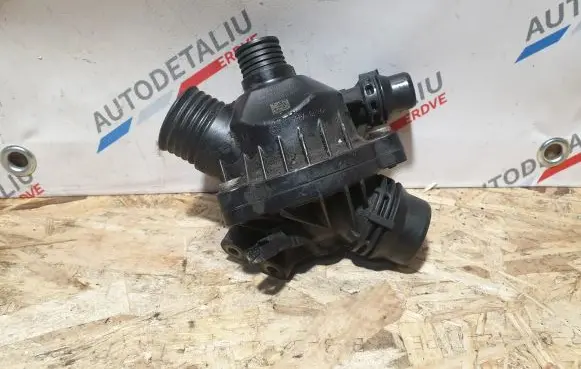 Thermostat/thermostat housing