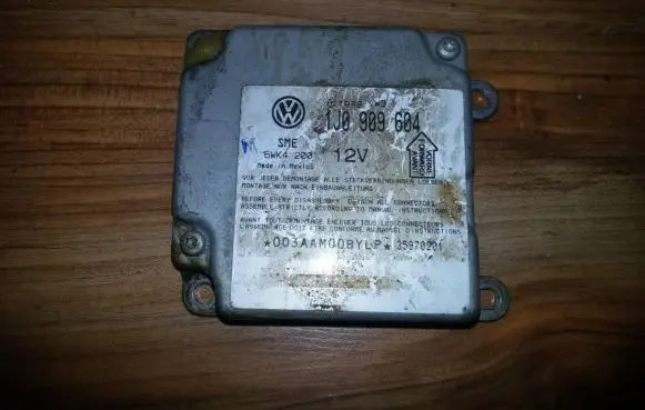 Volkswagen PASSAT B5 Airbag control unit/module 1J0909604 5WK4200