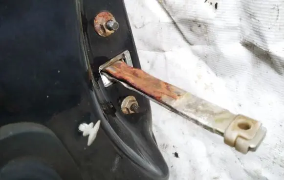 Mazda 626 Front door check strap stopper 