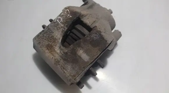 Volkswagen Golf VI Front brake caliper