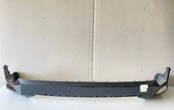 Rear bumper trim bar molding