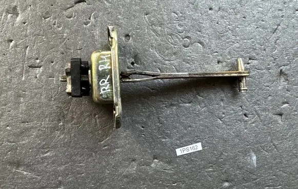 Mitsubishi Pajero Rear door check strap stopper MB257466