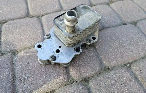 Opel Astra K Gearbox / Transmission oil cooler 55501530- 55512270