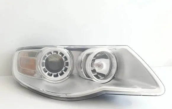 Volkswagen Touareg I Headlight/headlamp 7L6941032