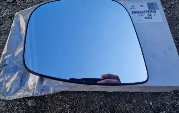 Peugeot Partner Wing mirror glass 1608181380