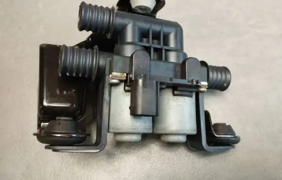 Coolant heater control valve