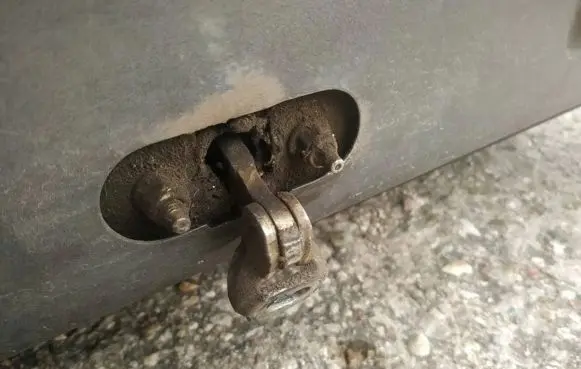 Rear door check strap stopper