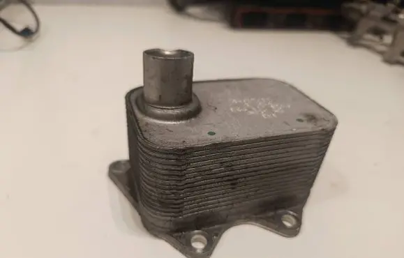 Audi A4 S4 B8 8K Engine oil radiator 06J117021J