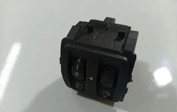 Headlight level height control switch
