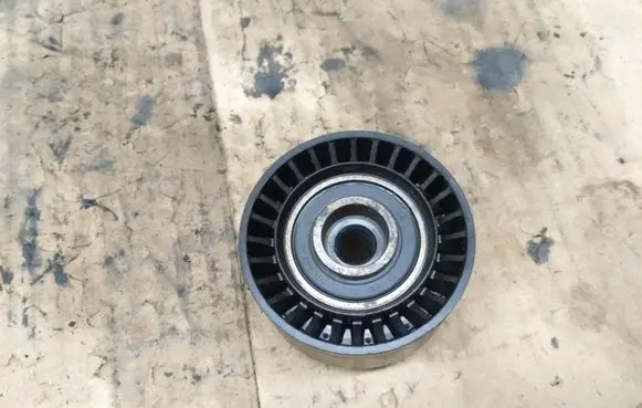 Ford Fiesta Alternator belt tensioner pulley 
