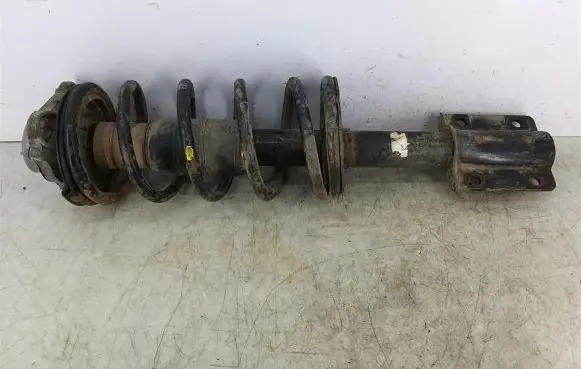 Front shock absorber with coil spring