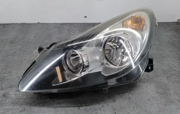 Opel Corsa D Headlight/headlamp 13217453