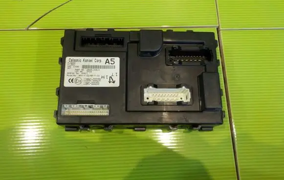 Nissan Juke I F15 Central body control module 284B11KB1D 8AB31