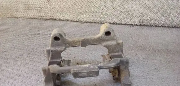 Volkswagen Caddy Brake caliper pad carrier rear 
