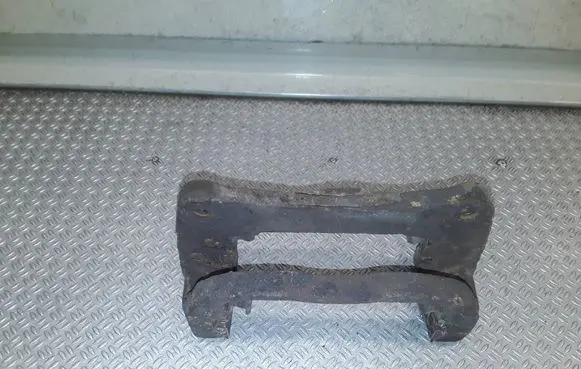 Subaru Impreza III Front Brake Caliper Pad/Carrier